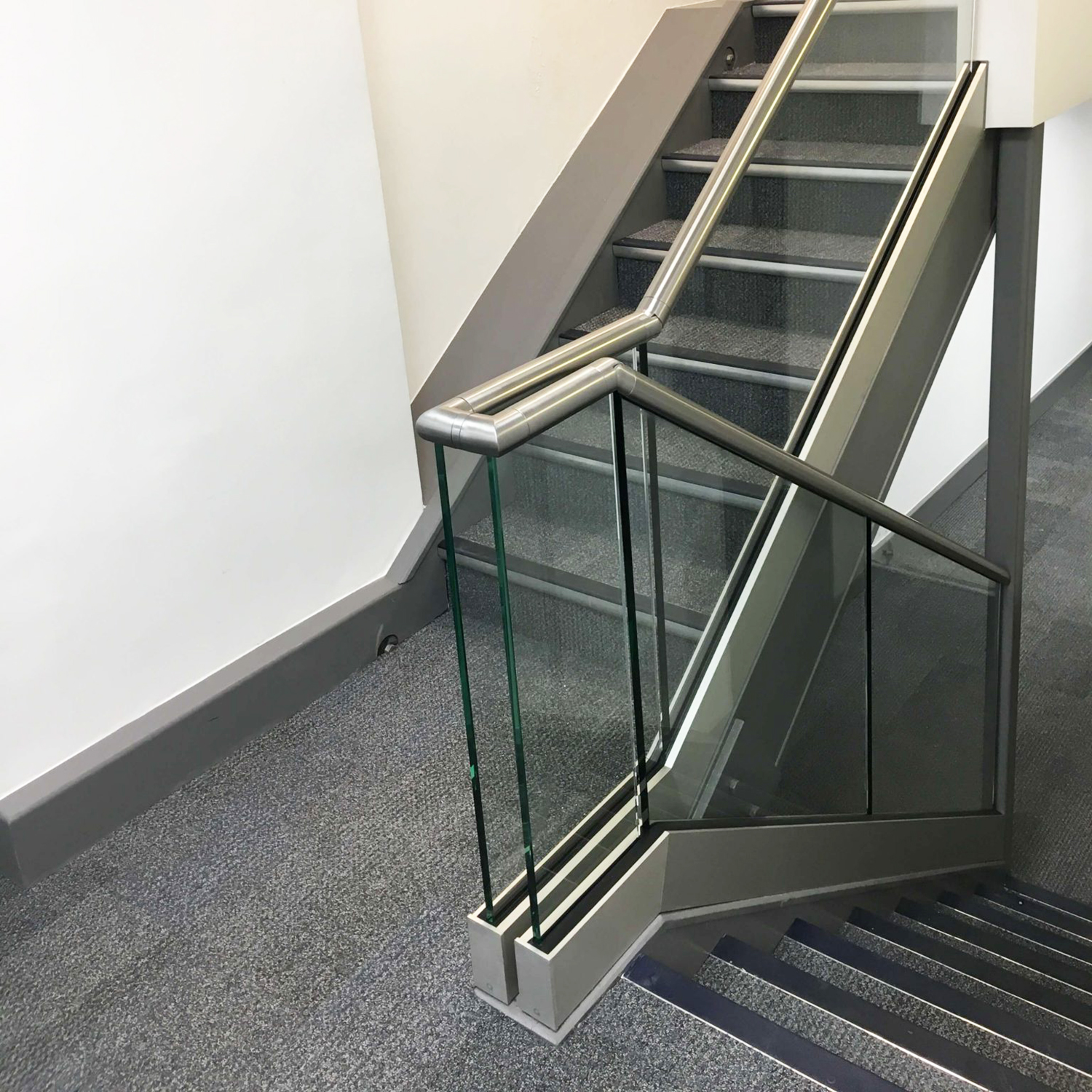 Stair corner with In-floor All Glass Railing System