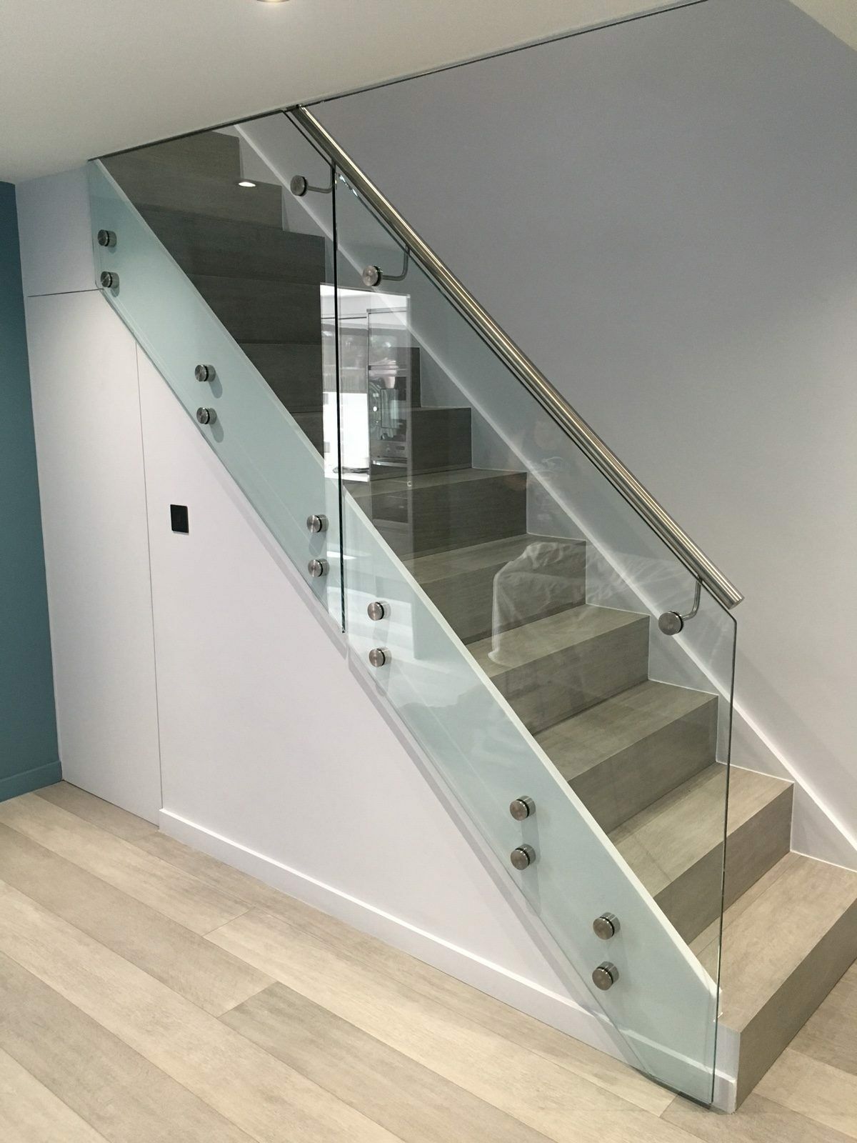 Contemporary glass balustrade fixed by glass pin