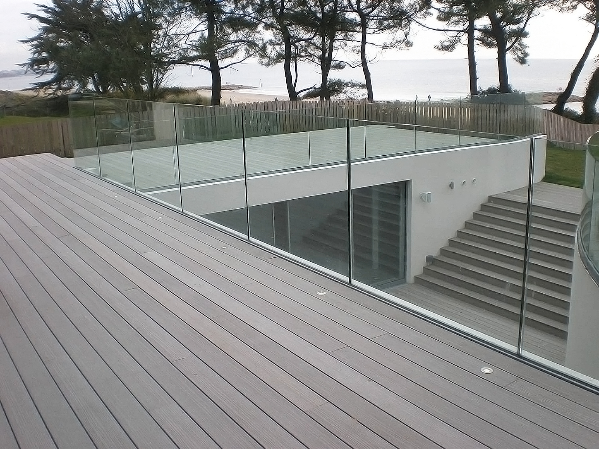 Frameless in-floor glass balustrade on terrace